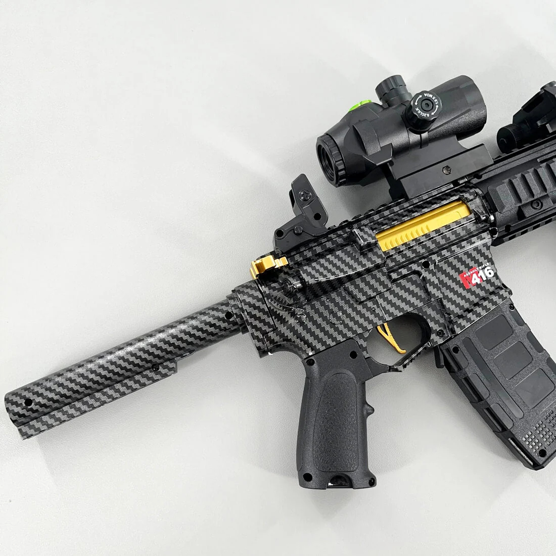 Carbon Fiber Gold Embellished M416 Gel Blaster